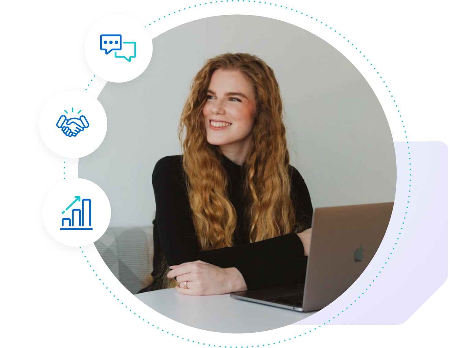 Woman on laptop looking to the side with a smile