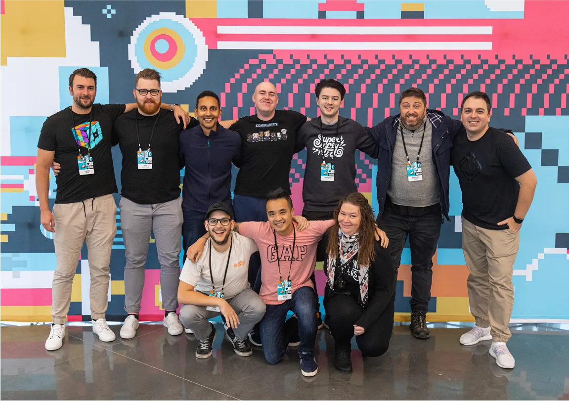 brisbane hub with people standing in front of a wall graphic