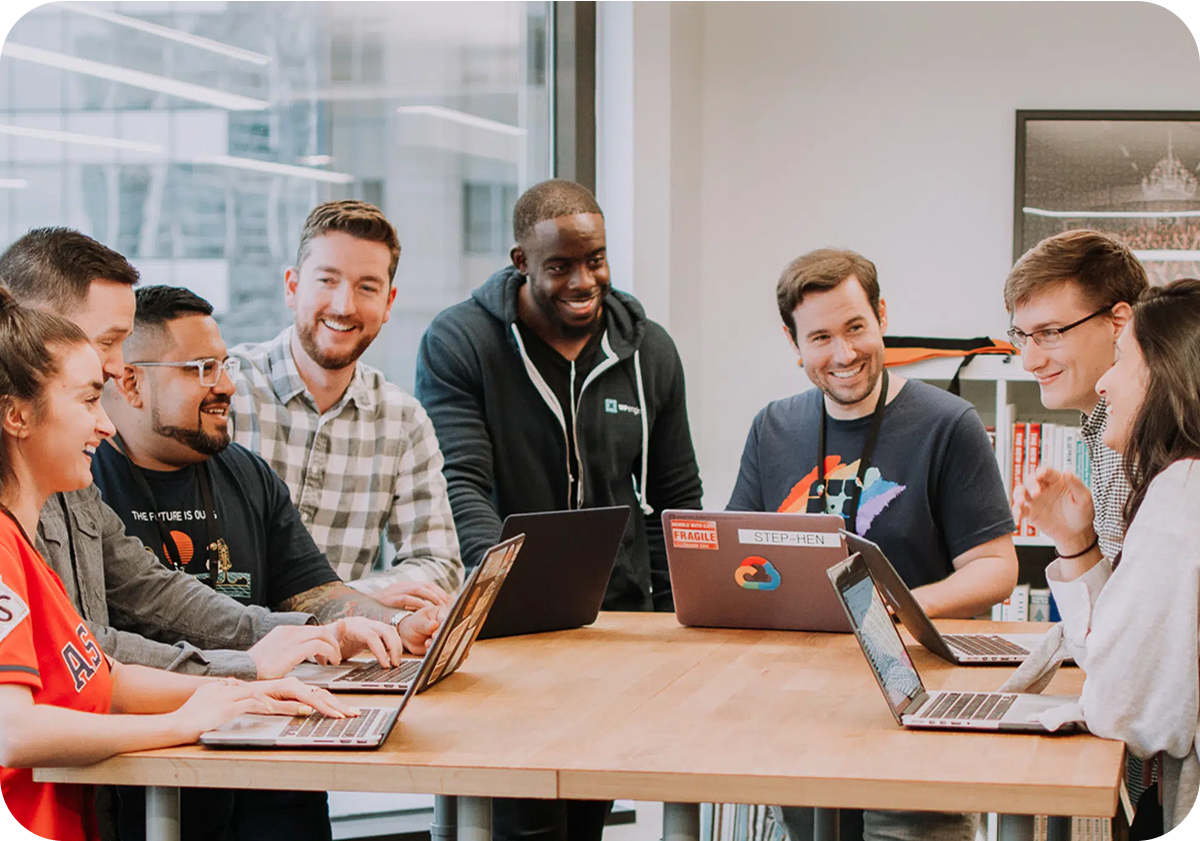 people around table representing DEI